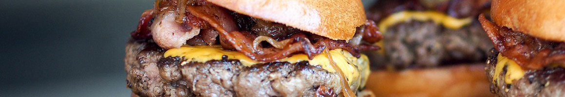 Eating Burger Sandwich Pub Food at The Avenue Bar Allston restaurant in Boston, MA.